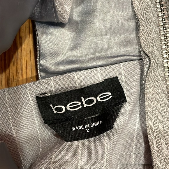 Bebe mitered light grey pinstripe side cutout flare leg jumpsuit sz 2 - Picture 6 of 15